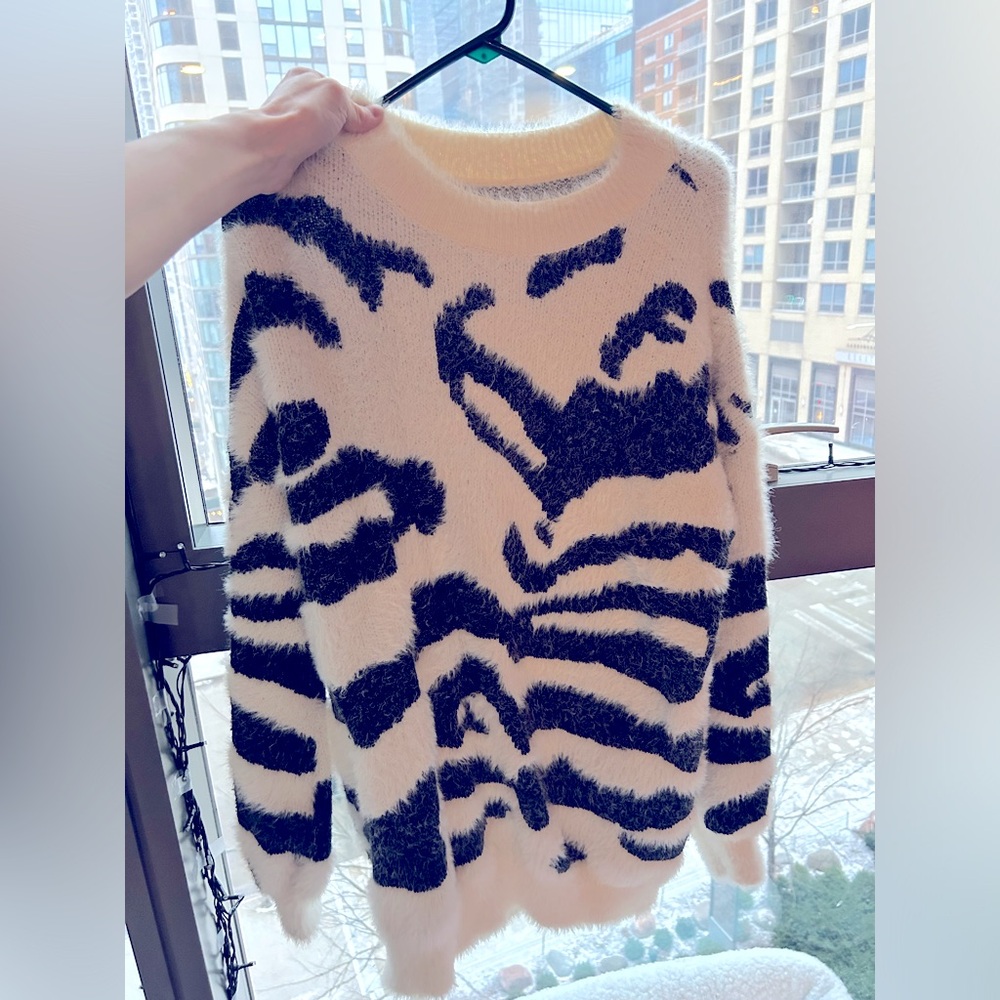Furry/fuzzy oversized sweater.

Worn only a handful of times in great shape.